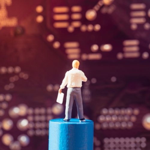 miniature-people-teacher-stand-back-alone-blur-circuit-board-background-using-as-business-technology-education-concept